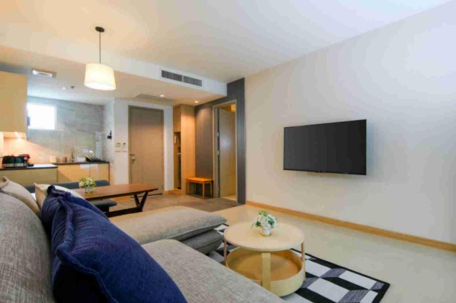 Craft Resort & Villas, Phuket Town Exterior foto A living room in a serviced apartment in Beijing, China