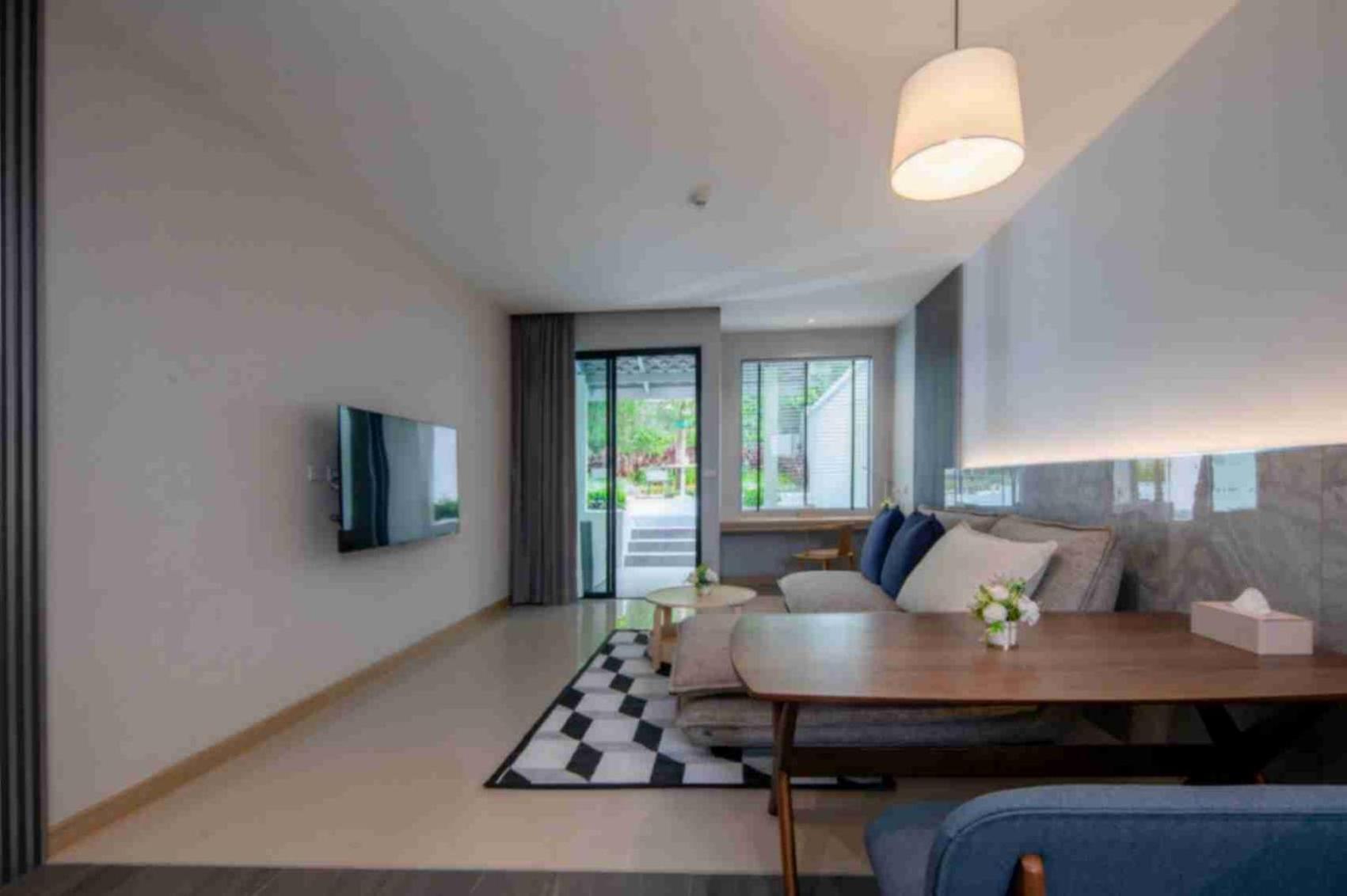 Craft Resort & Villas, Phuket Town Exterior foto A living room in a typical landed property in Singapore.