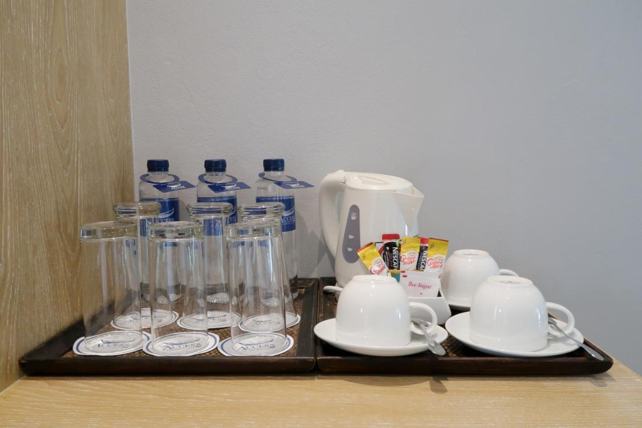 Craft Resort & Villas, Phuket Town Exterior foto A typical hotel welcome drink tray
